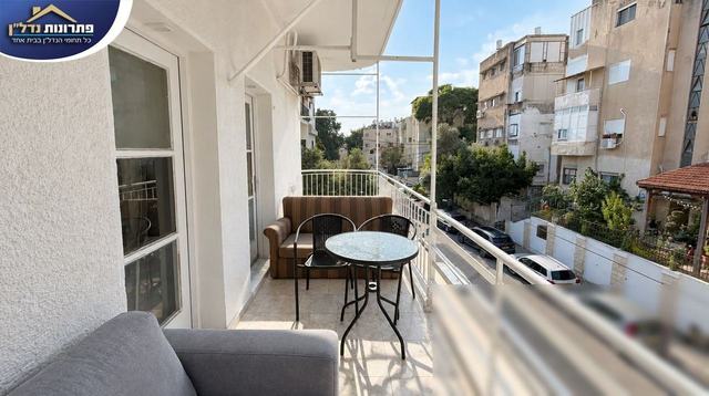 מרפסת שמש של כ-20 מ״ר – דירת 4 חדרים ברחוב בן יהודה, חיפה